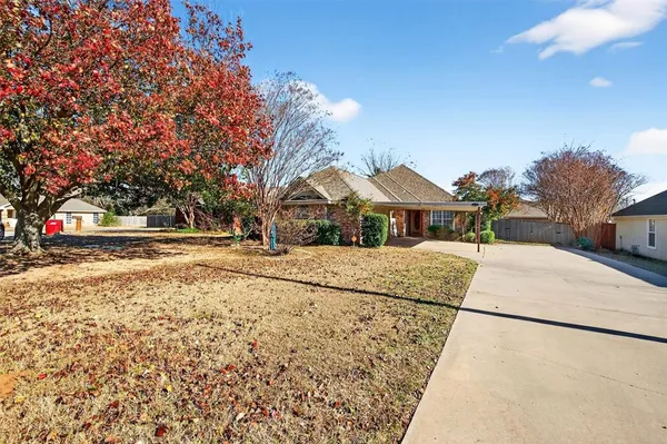 a front view of house with a yard