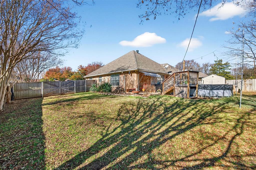 207 Gayle Circle Bells, TX 75414 - Photo 26 of 30 a house view with a swimming pool