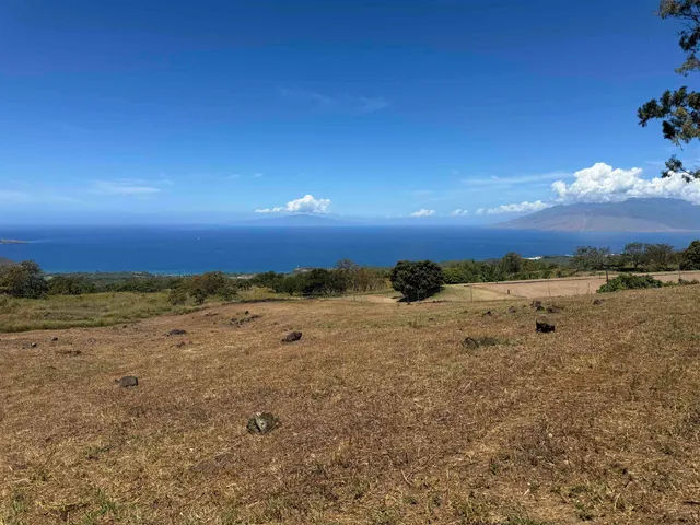 a view of mountain with lake view