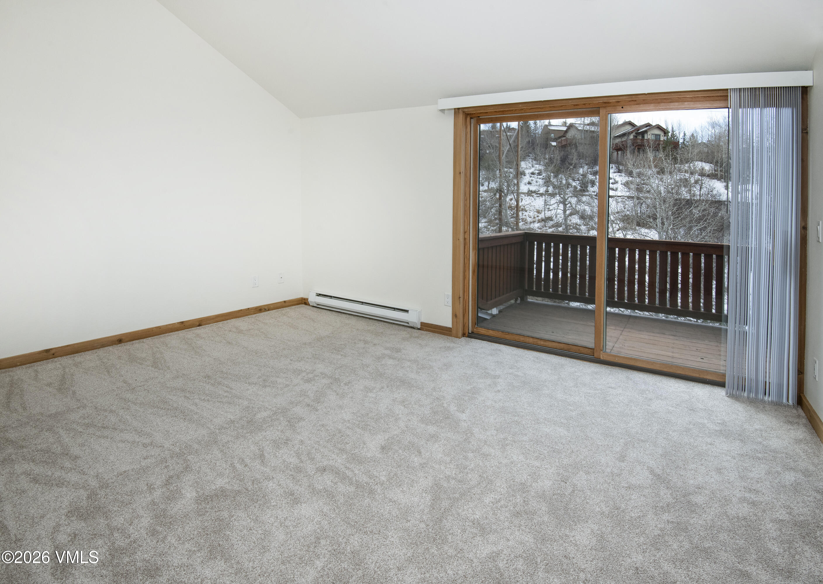 2355 Old Trail Road, Unit 3 Avon, CO 81620 - Photo 20 of 34 an empty room with floor to ceiling window