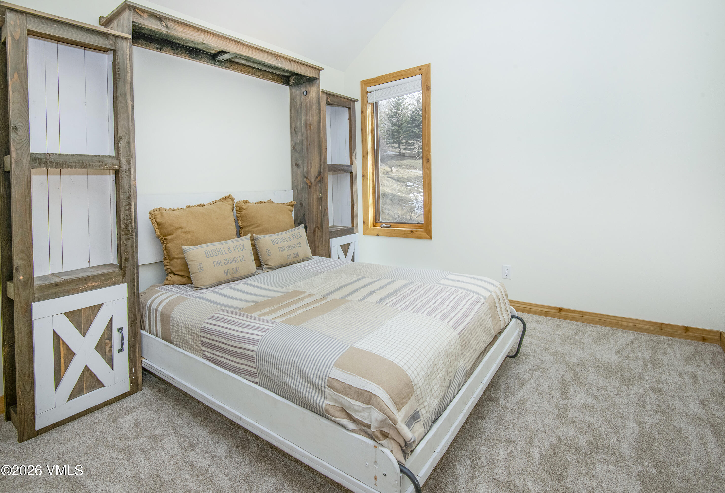 2355 Old Trail Road, Unit 3 Avon, CO 81620 - Photo 24 of 34 a bedroom with a bed and a window