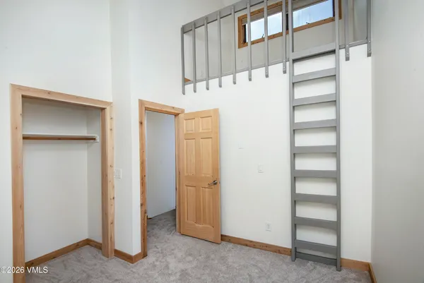 a view of an empty walk in closet