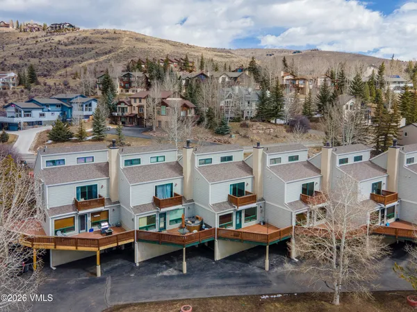 a view of a outdoor space with lounge chairs