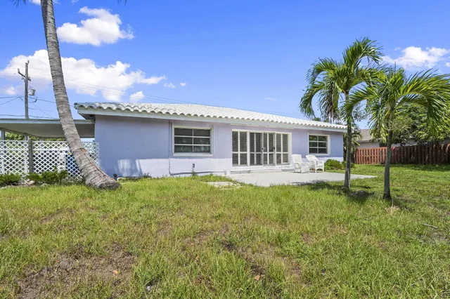a house view with a garden space