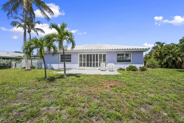 a house with garden in front of it