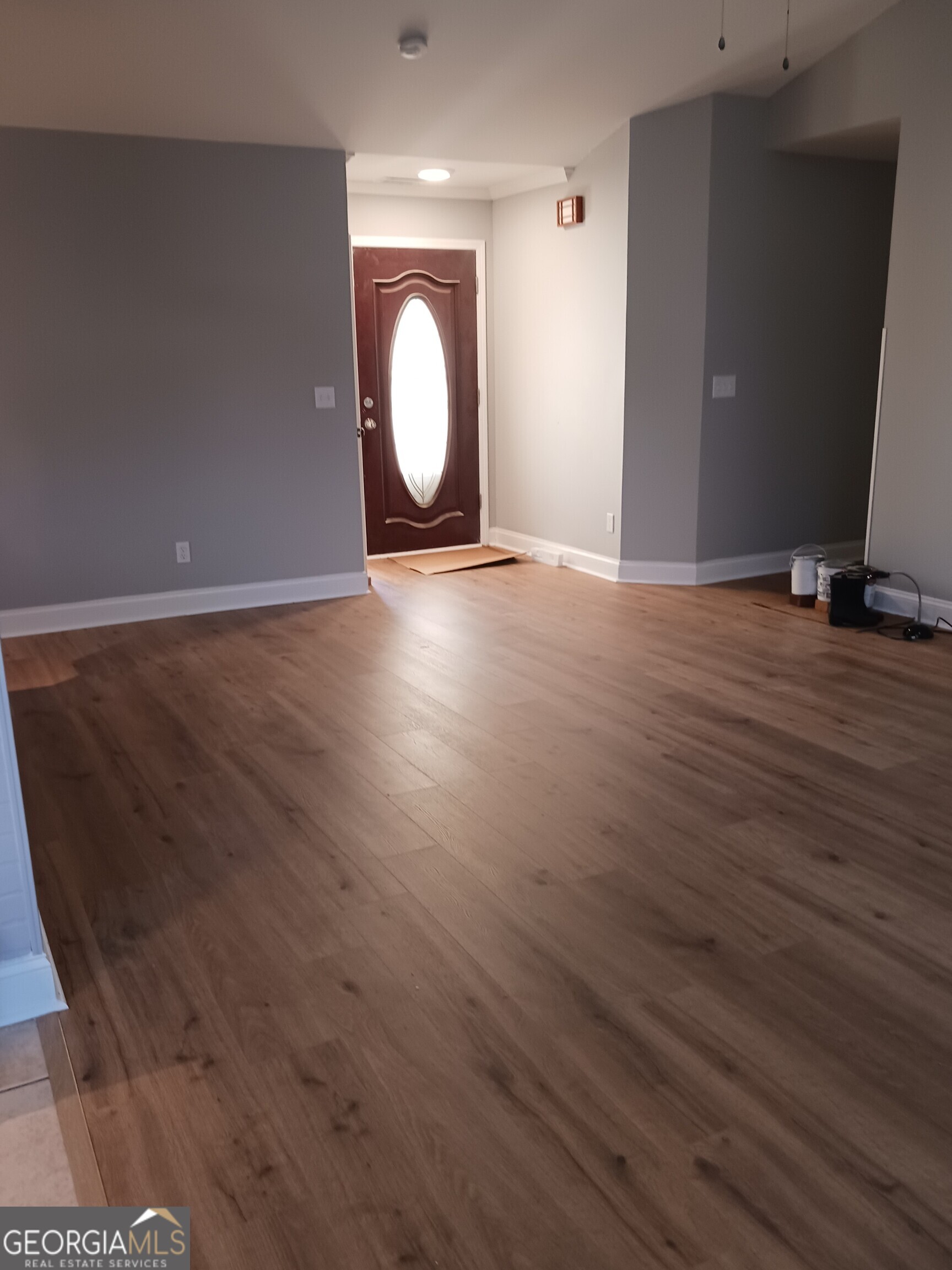 907 Downing Drive Bethlehem, GA 30620 - Photo 12 of 26 a view of a room with wooden floor and window