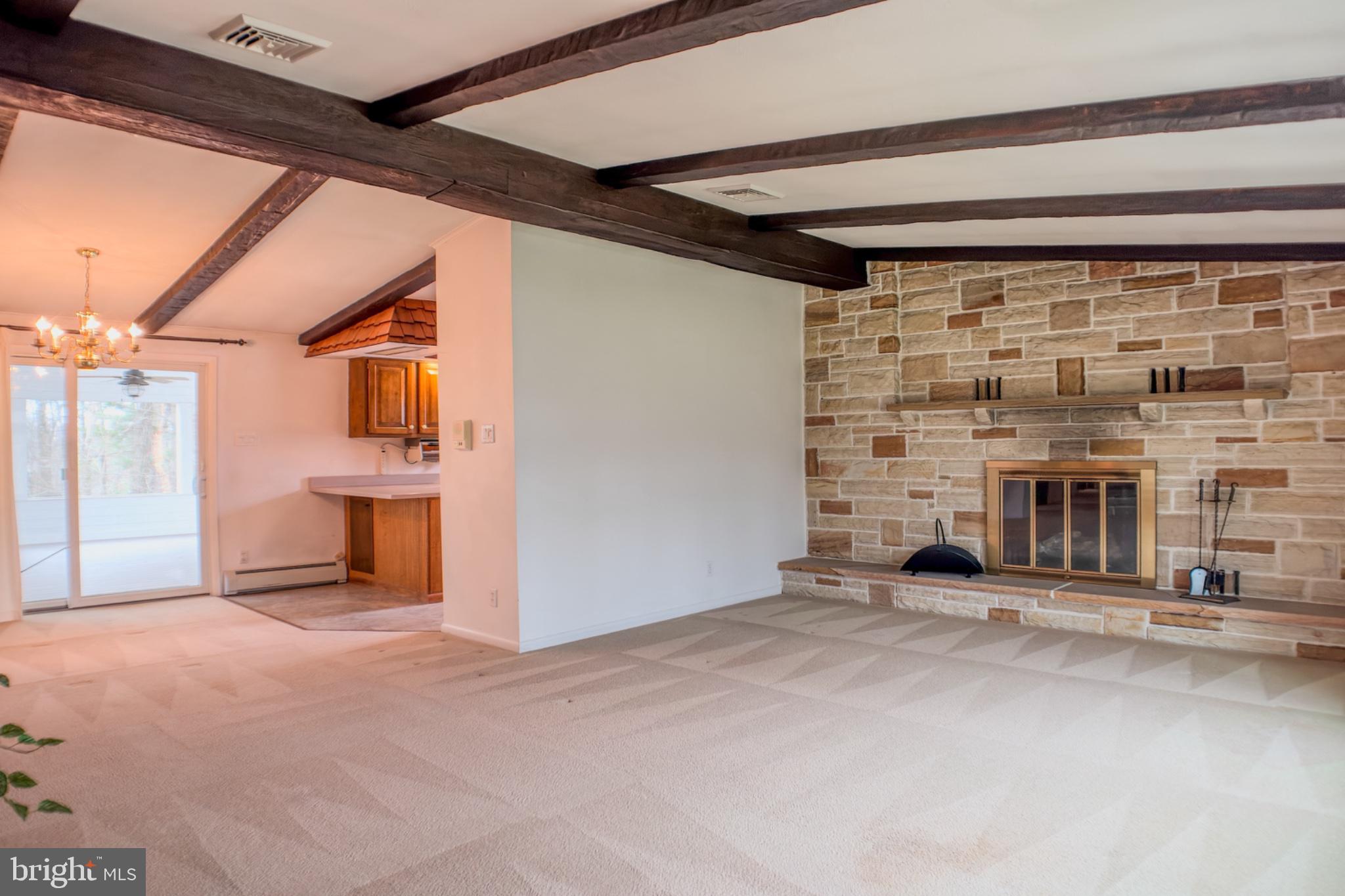 467 Swanger Road New Columbia, PA 17856 - Photo 14 of 45 a view of an empty room with a fireplace
