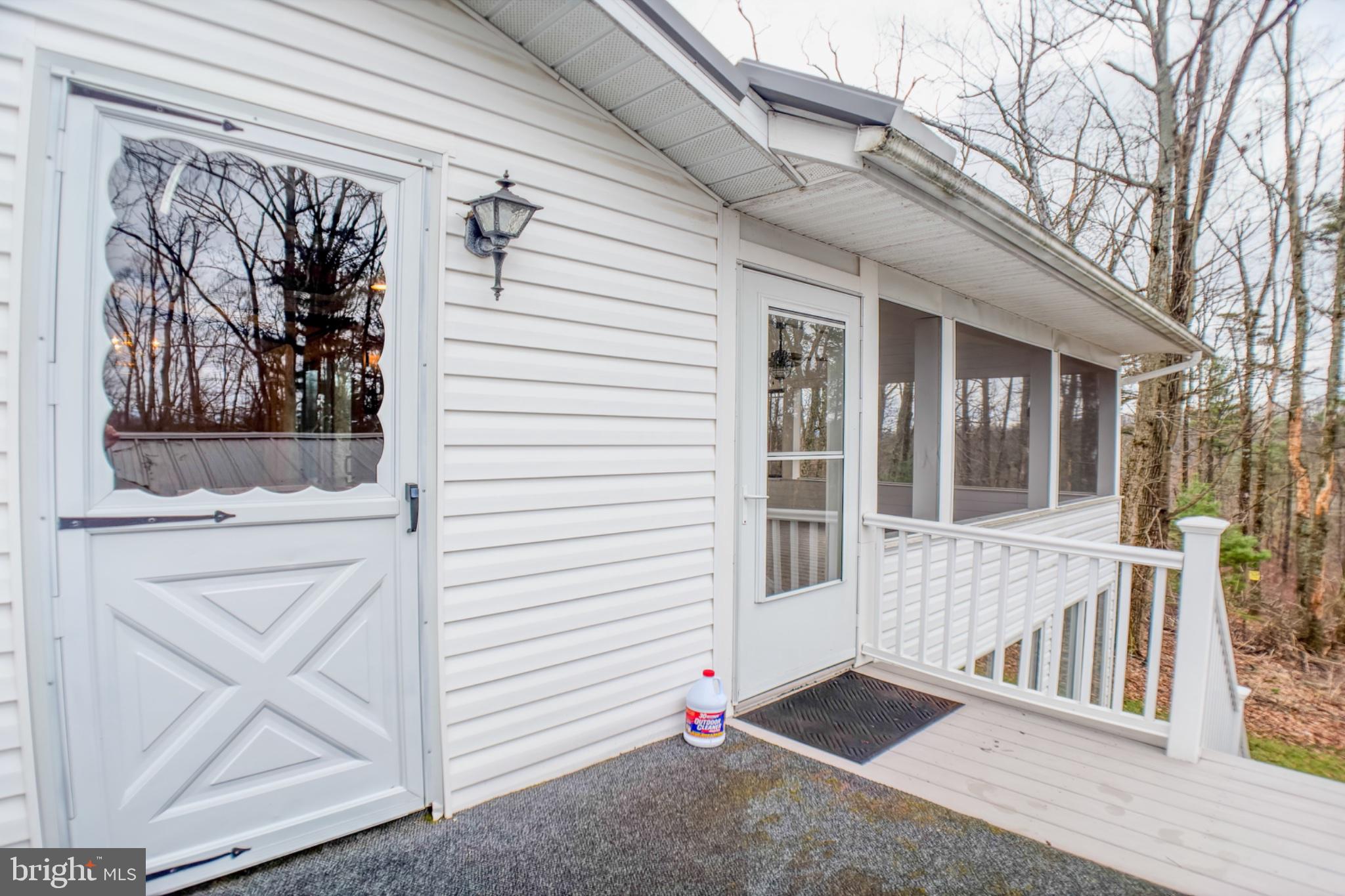 467 Swanger Road New Columbia, PA 17856 - Photo 19 of 45 a view of porch with a bench