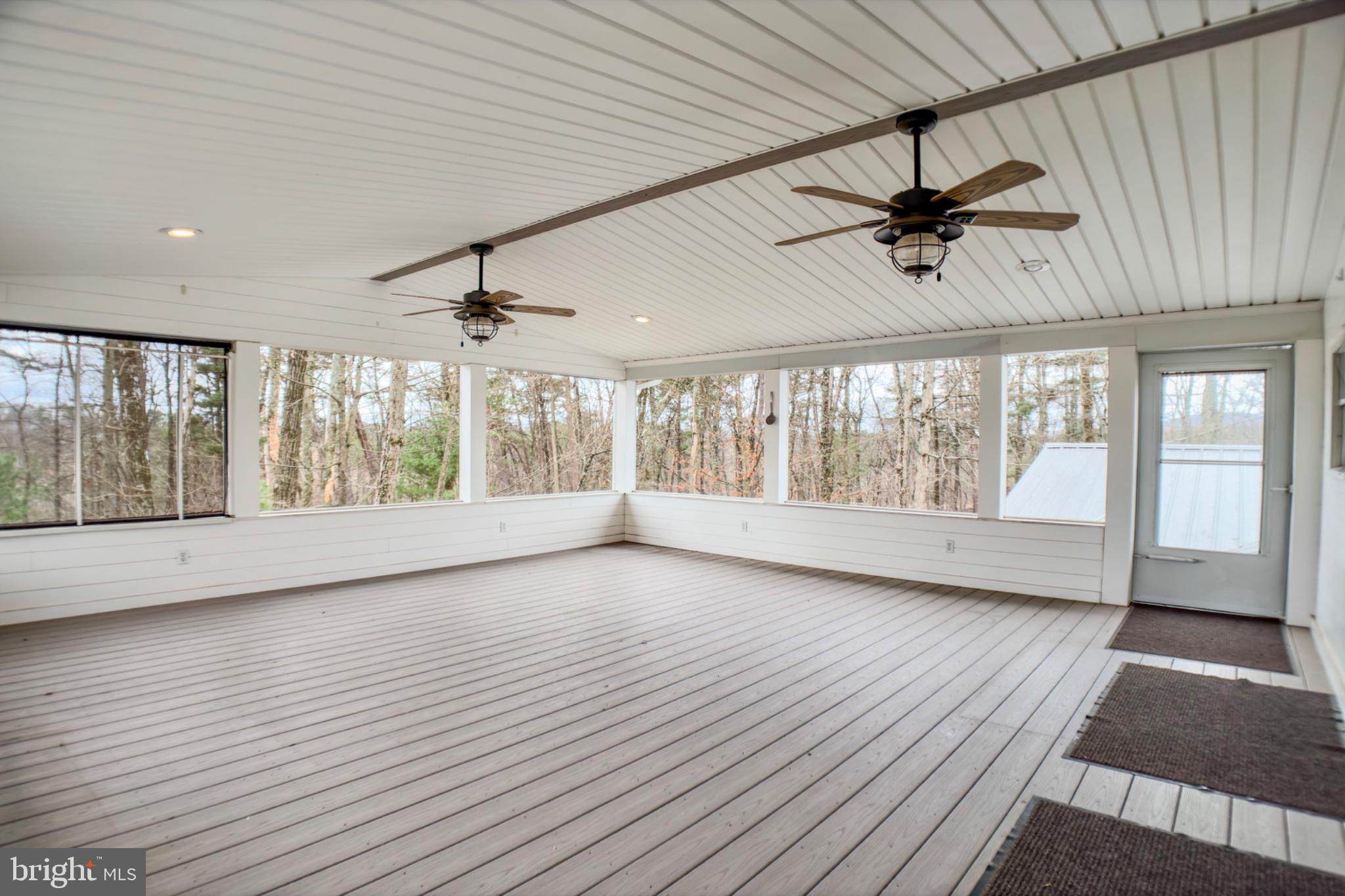 467 Swanger Road New Columbia, PA 17856 - Photo 20 of 45 a view of room with wooden floor and balcony