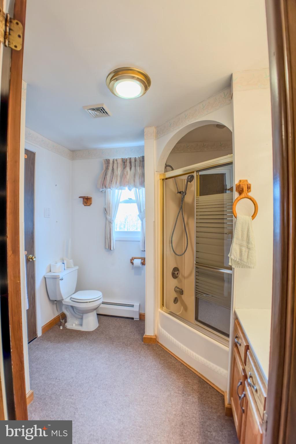 467 Swanger Road New Columbia, PA 17856 - Photo 24 of 45 a bathroom with a toilet and shower