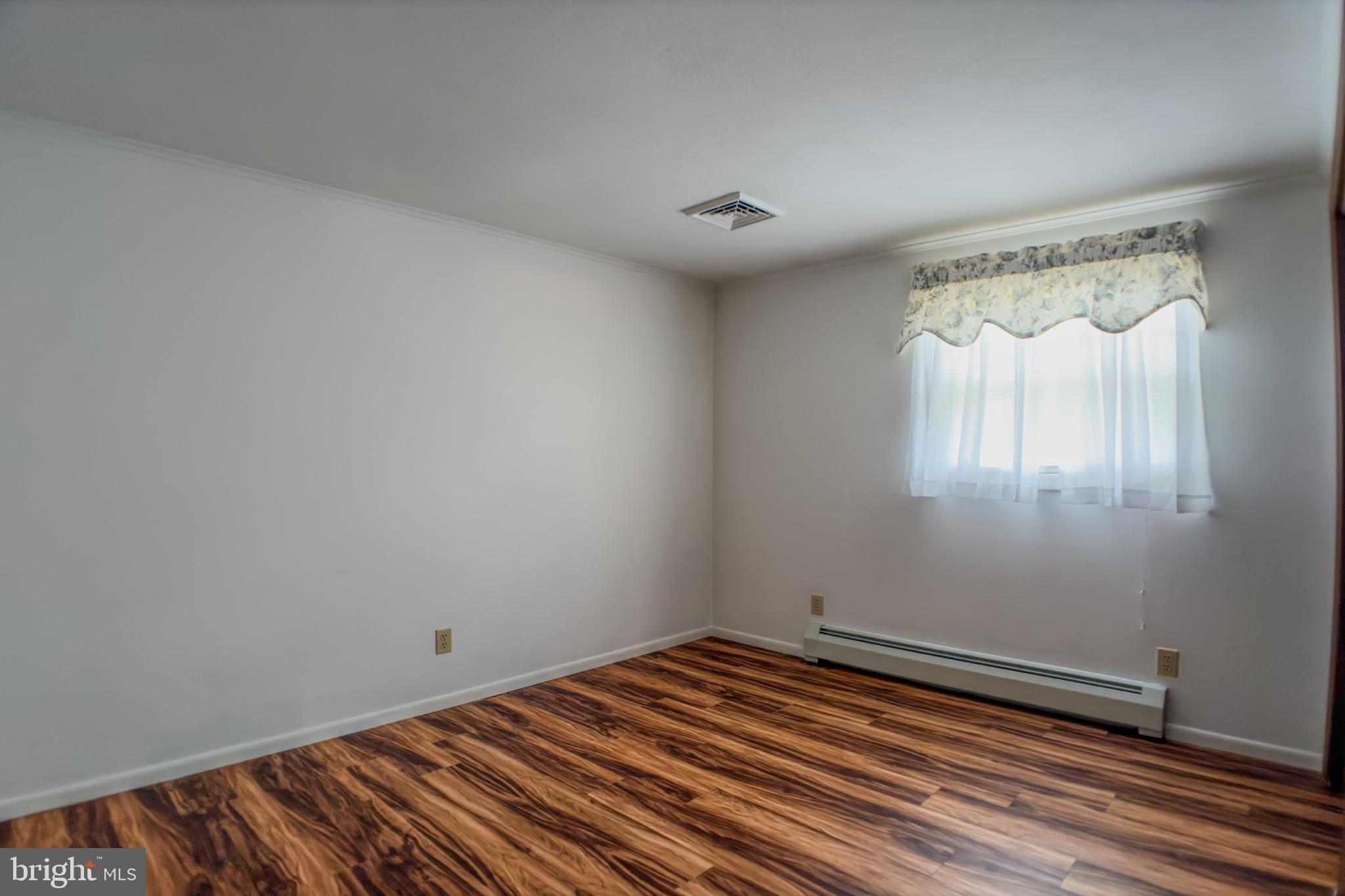 467 Swanger Road New Columbia, PA 17856 - Photo 26 of 45 a view of a room with wooden floor and natural light