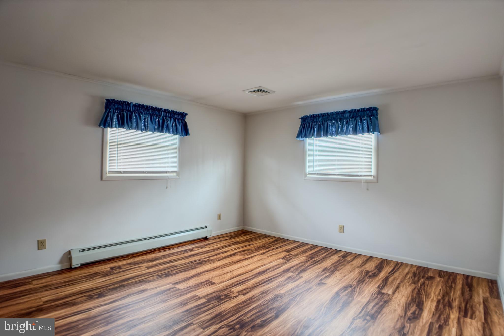 467 Swanger Road New Columbia, PA 17856 - Photo 27 of 45 a view of a room with wooden floor and window