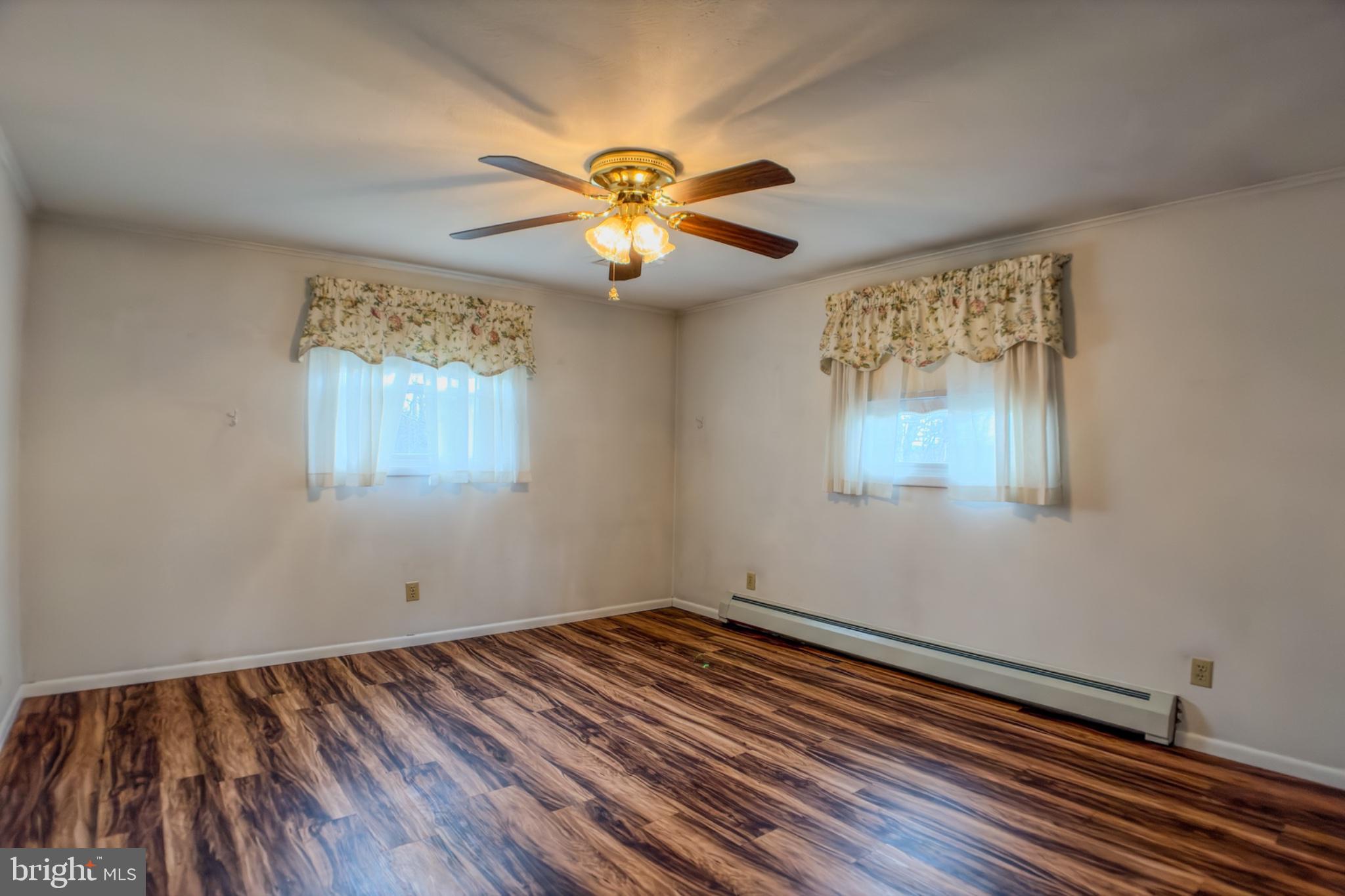 467 Swanger Road New Columbia, PA 17856 - Photo 28 of 45 a view of room with window and wooden floor