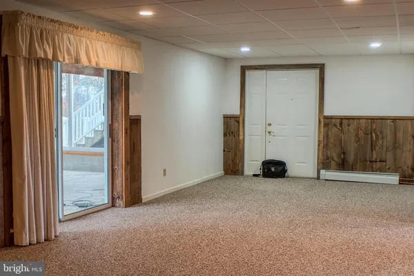 an empty room with windows