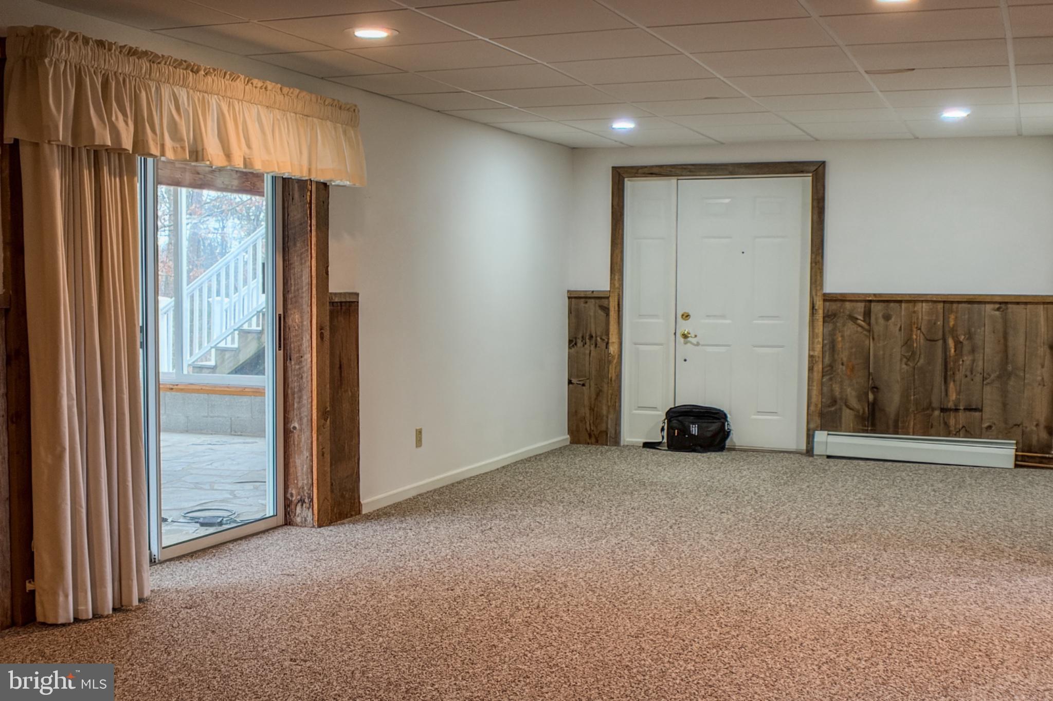 467 Swanger Road New Columbia, PA 17856 - Photo 3 of 45 an empty room with windows