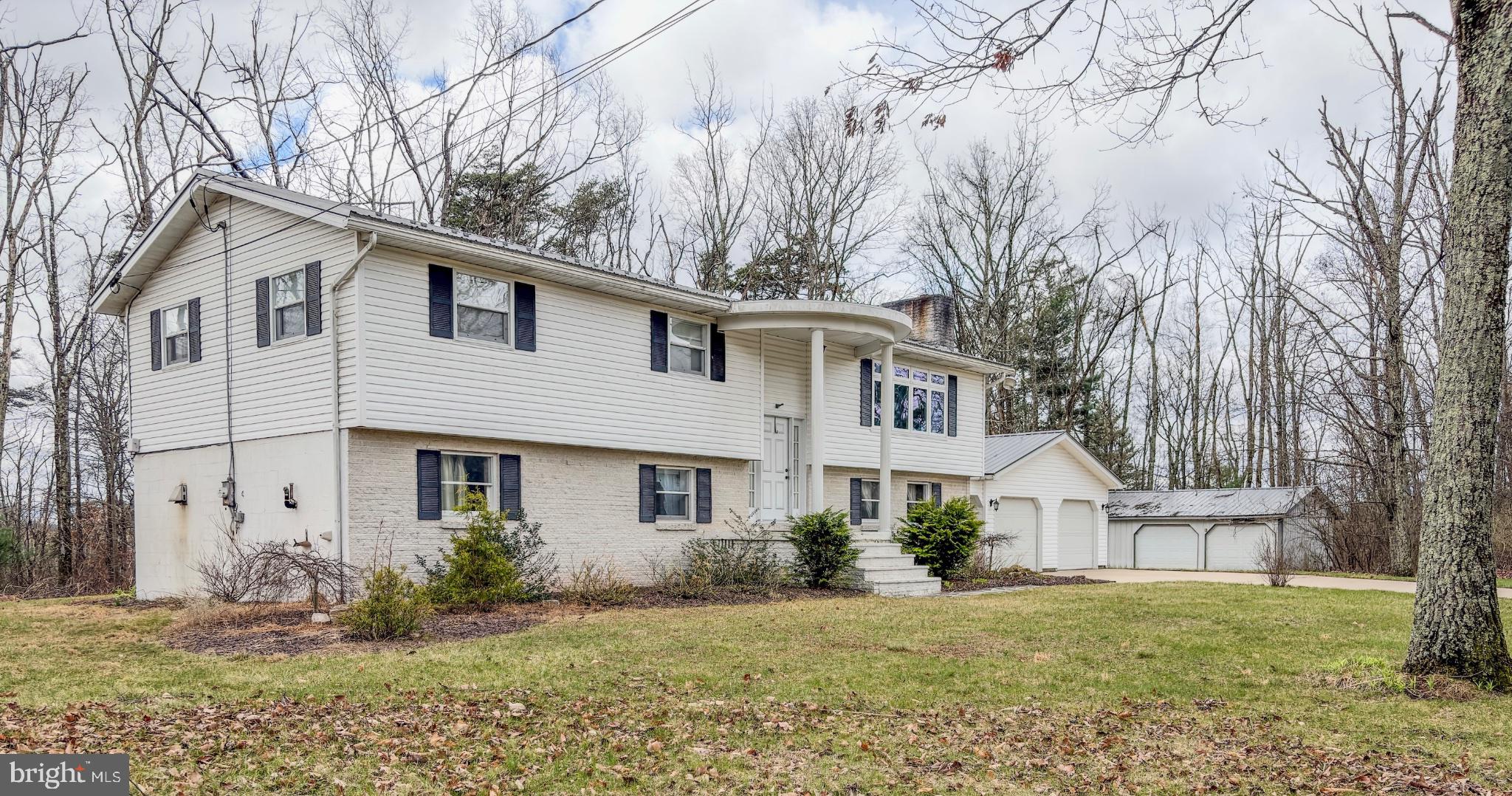 467 Swanger Road New Columbia, PA 17856 - Photo 40 of 45 a front view of a house with garden