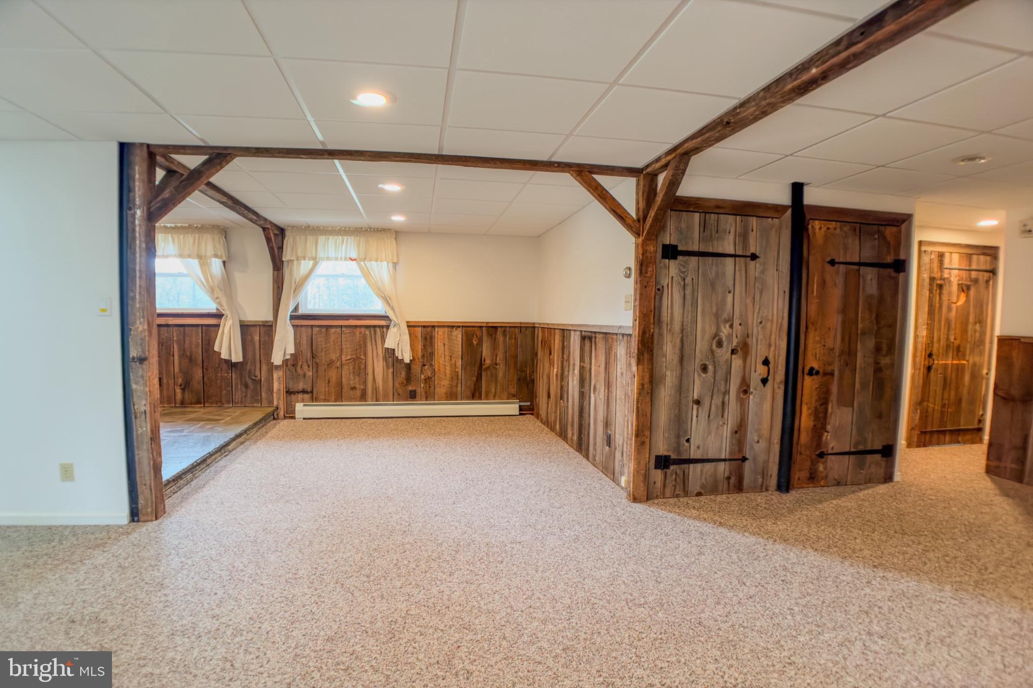 467 Swanger Road New Columbia, PA 17856 - Photo 4 of 45 a view of a hallway with wooden shelves