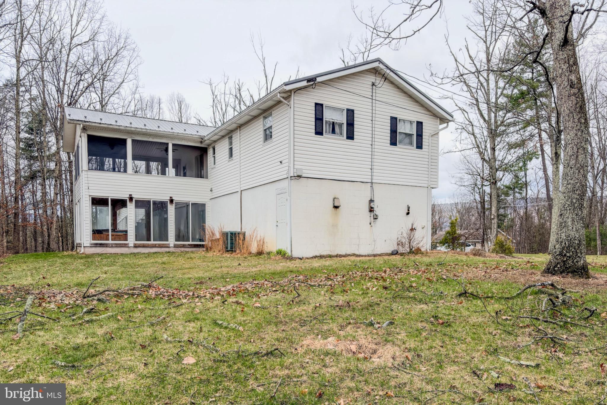 467 Swanger Road New Columbia, PA 17856 - Photo 41 of 45 a view of a white house with a yard