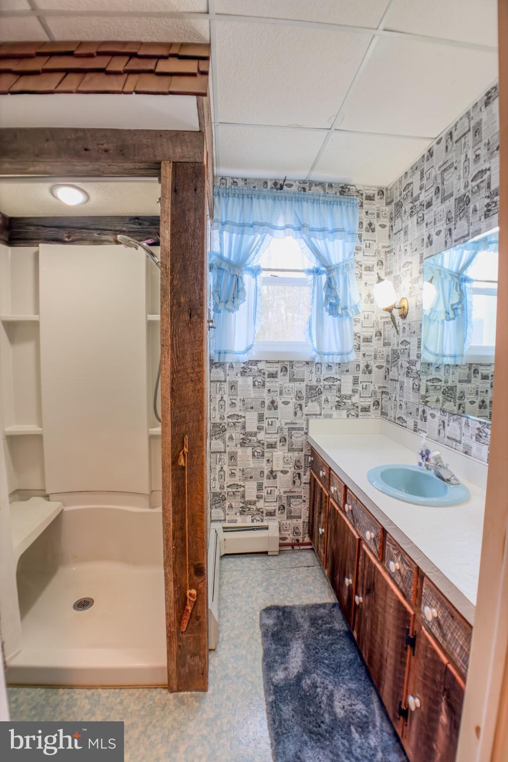 467 Swanger Road New Columbia, PA 17856 - Photo 9 of 45 a bathroom with a tub sink and mirror