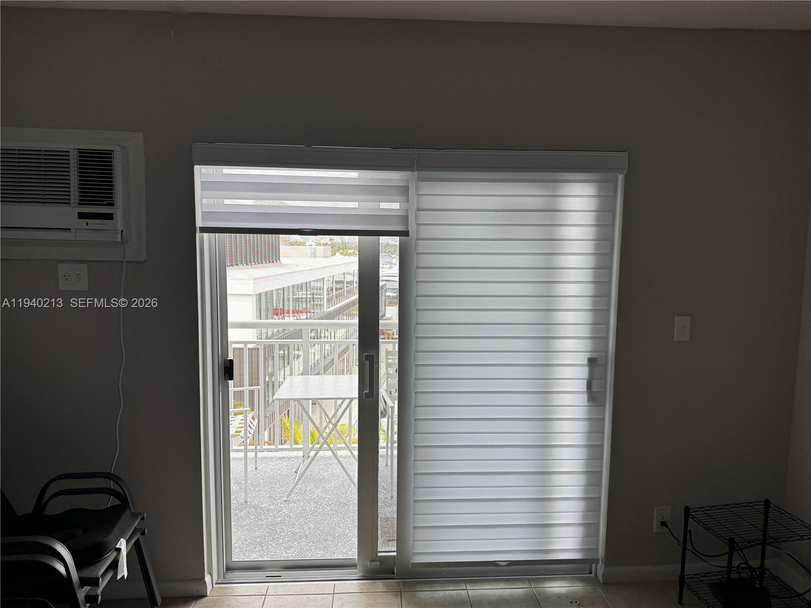 200 South Birch Road, Unit 702 Fort Lauderdale, FL 33316 - Photo 11 of 19 a room with a window