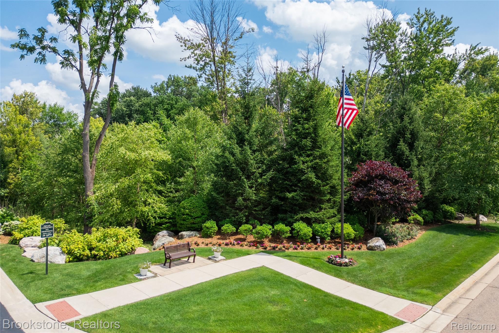 2167 Sanctuary Court Rochester, MI 48309 - Photo 35 of 68 Manicured lawn with mature trees and diverse landscaping