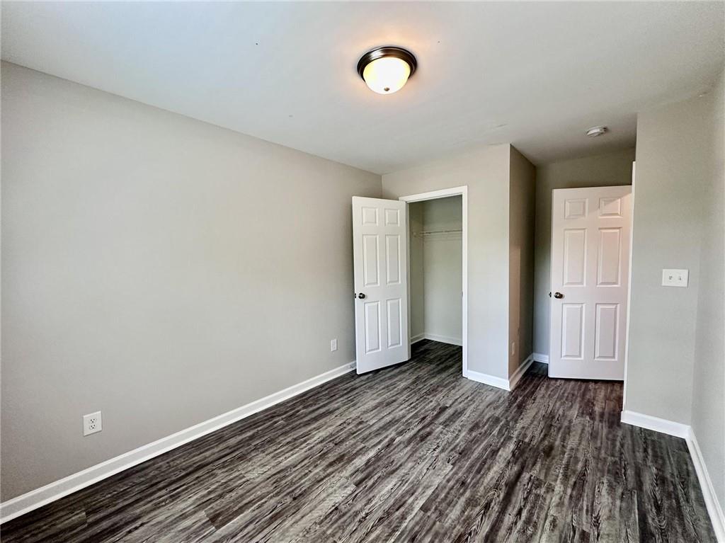 722 Keeshono St Union Union City, GA 30291 - Photo 6 of 7 a view of a room with wooden floor