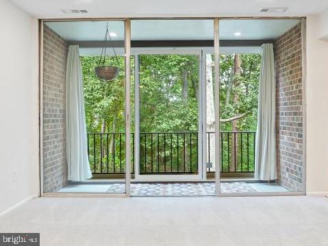 8431 Greenbelt Road Greenbelt, MD 20770 - Photo 1 of 16 a view of a room that has a large window and front door