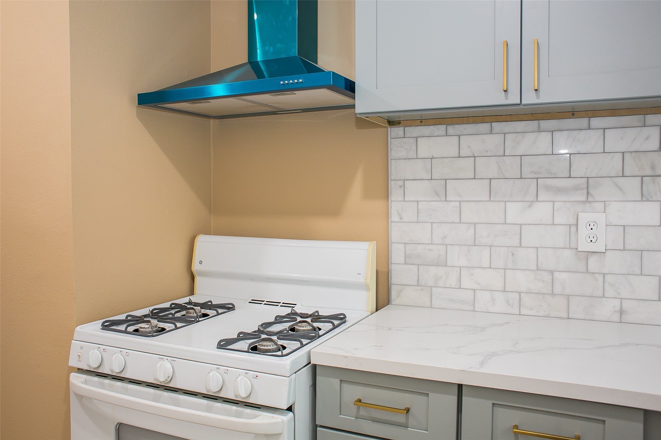 2301 Albans Road Houston, TX 77005 - Photo 16 of 17 a white stove top oven sitting inside of a kitchen