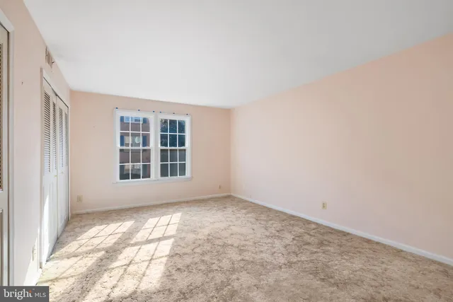 an empty room with a window