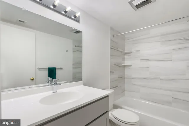 a view of balcony with wooden floor and fence