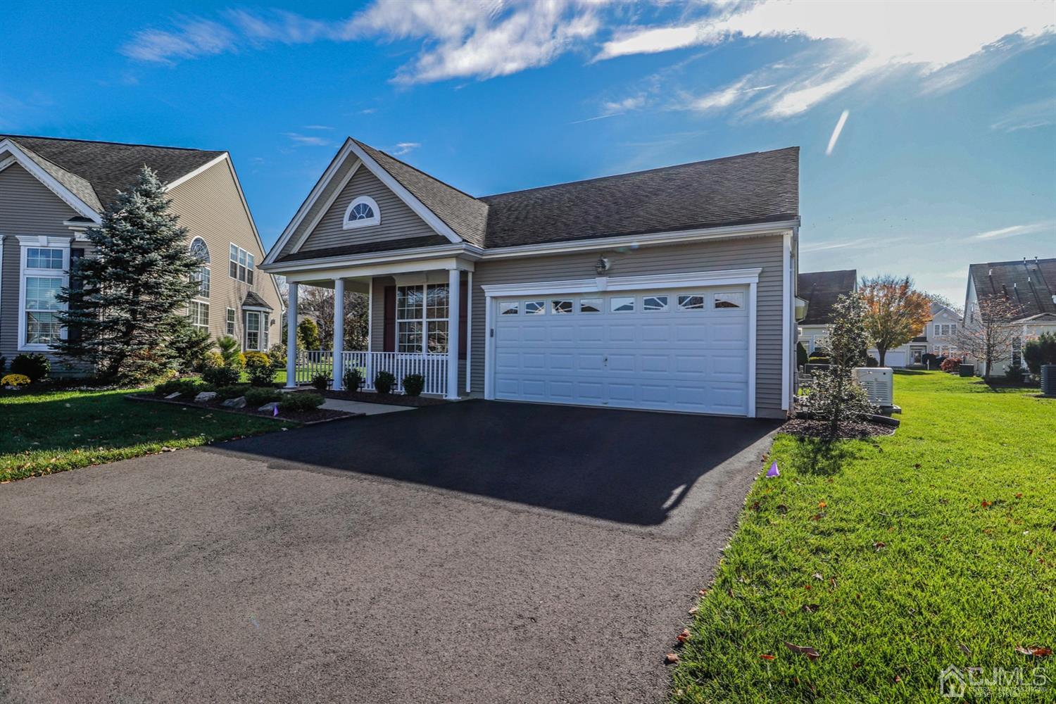 8 Pebble Creek Road Dayton, NJ 08810 - Photo 1 of 19 a front view of a house with garden