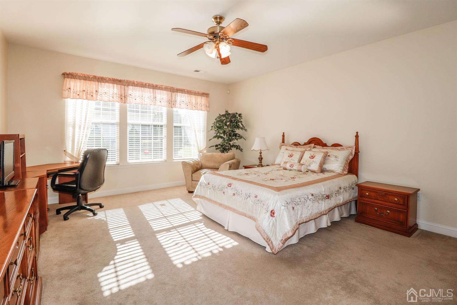 8 Pebble Creek Road Dayton, NJ 08810 - Photo 11 of 19 a bedroom with a bed and a desk