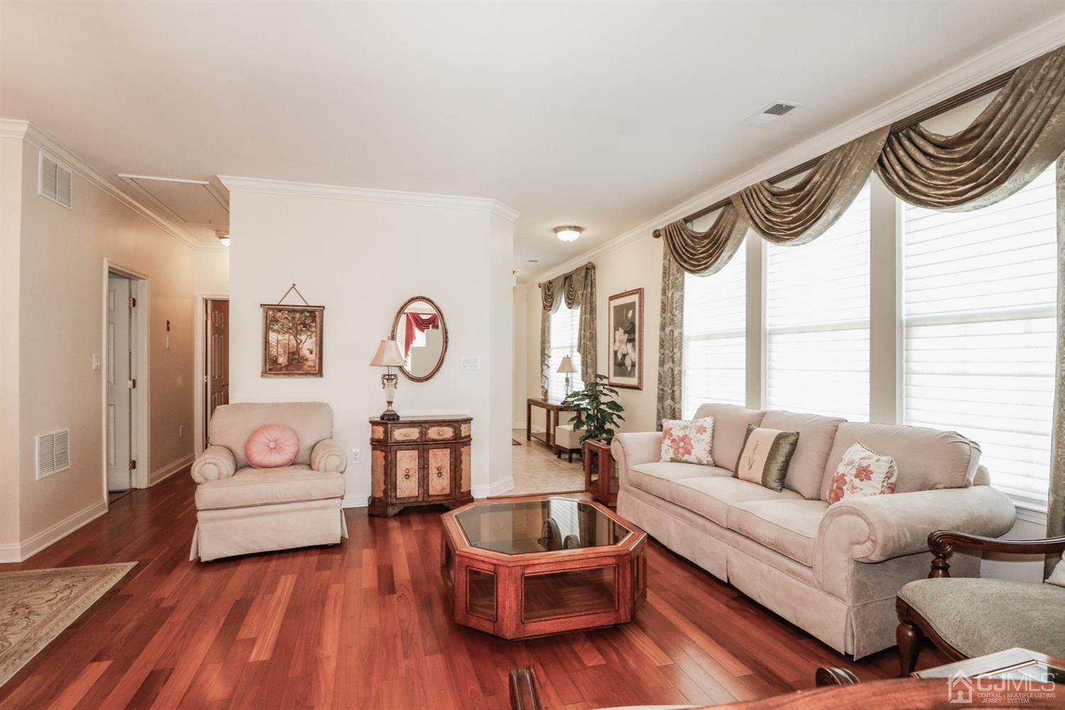 8 Pebble Creek Road Dayton, NJ 08810 - Photo 10 of 19 a living room with furniture and a large window