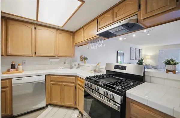 a kitchen with a stove and a sink