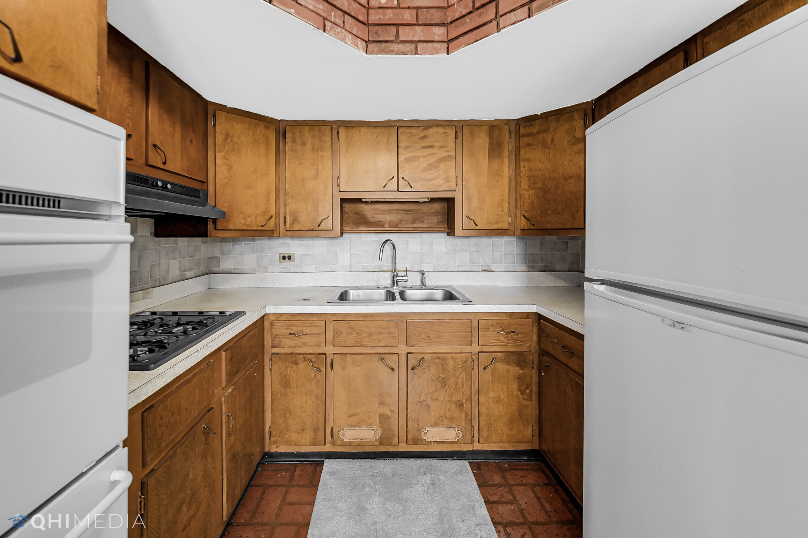 381 North 4th Avenue, Unit B Des Plaines, IL 60016 - Photo 8 of 22 a kitchen with stainless steel appliances a sink stove and cabinets
