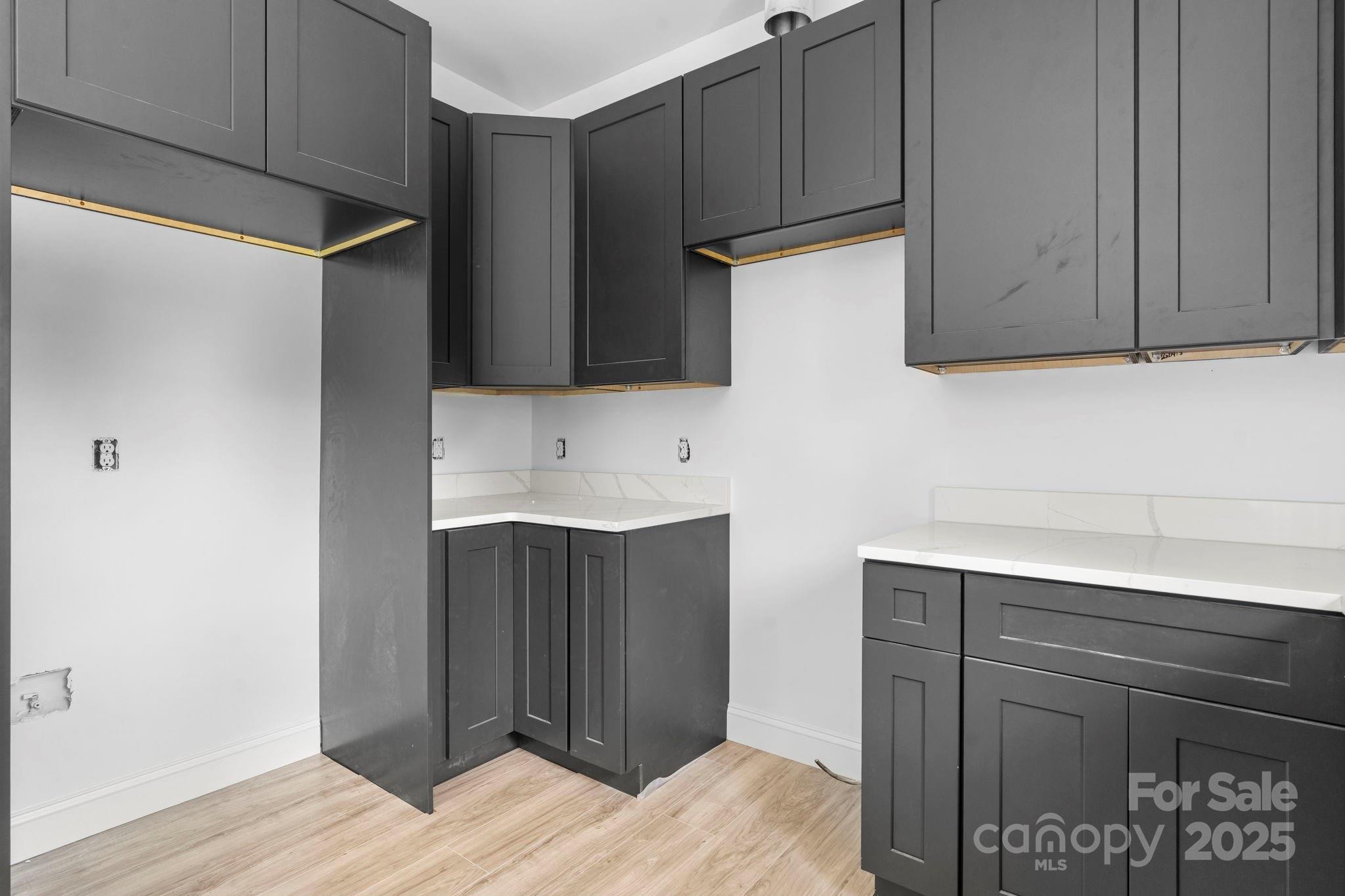 3137 Riber Lane Claremont, NC 28610 - Photo 12 of 25 a kitchen with a sink and cabinets