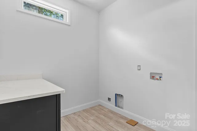 a bathroom with a sink and vanity
