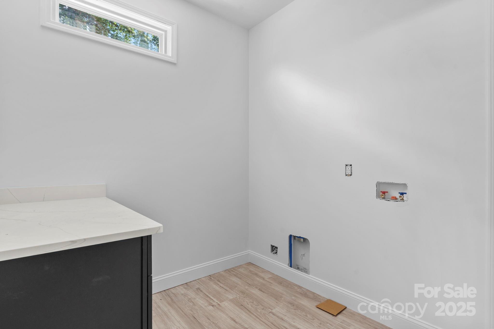 3137 Riber Lane Claremont, NC 28610 - Photo 14 of 25 a bathroom with a sink and vanity