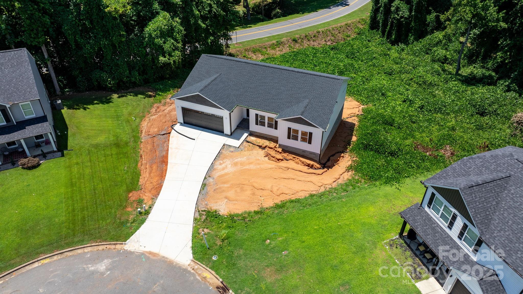 3137 Riber Lane Claremont, NC 28610 - Photo 2 of 25 an aerial view of a house