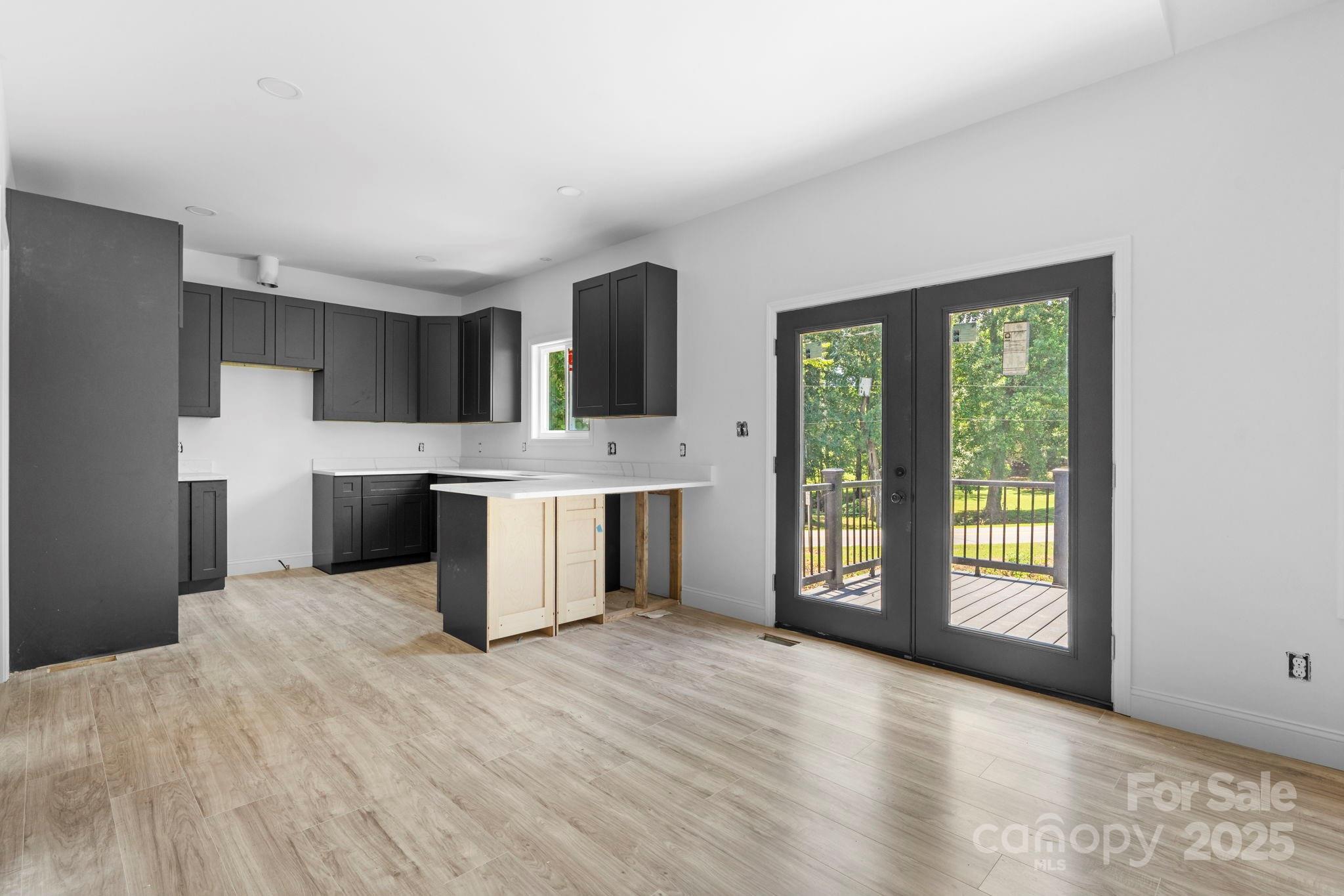 3137 Riber Lane Claremont, NC 28610 - Photo 8 of 25 a view of a kitchen with a sink dishwasher and a refrigerator