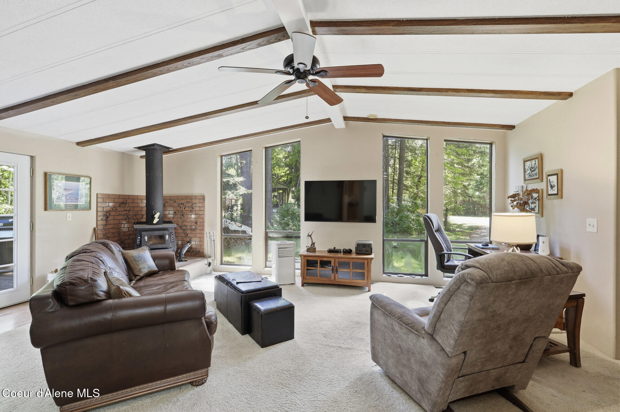 13118 Hellroaring Road Athol, ID 83801 - Photo 4 of 46 Living room with wood stove