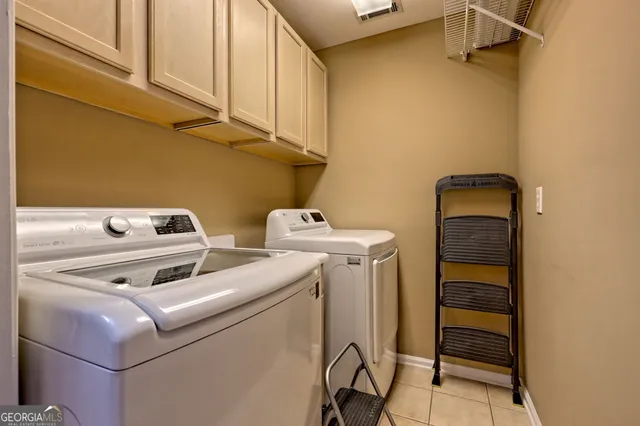 a room with gym equipment and a window