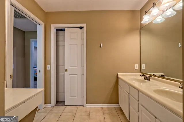 a bathroom with a tub and a shower