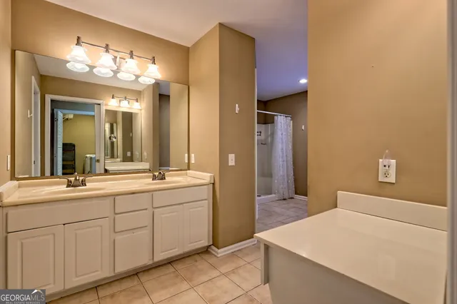 a view of a house with backyard and deck