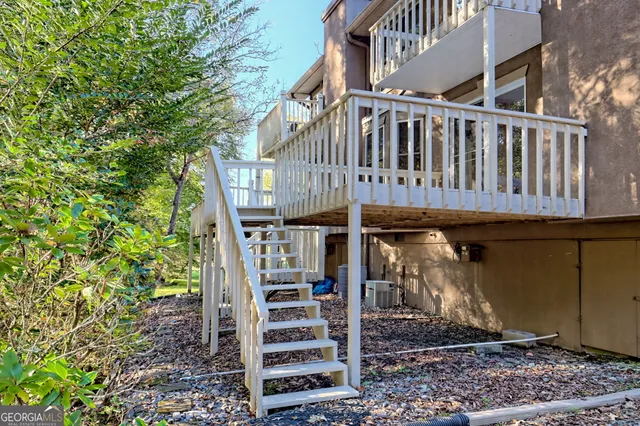 a view of a pathway with a garden