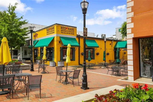 a view of a building with sitting area