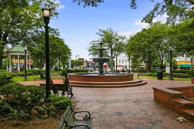 a view of an house with outdoor space and sitting area