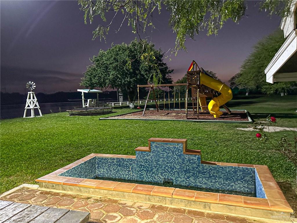 0 West Arroyo City Boulevard Rio Hondo, TX 78583 - Photo 11 of 29 a view of a park with slide