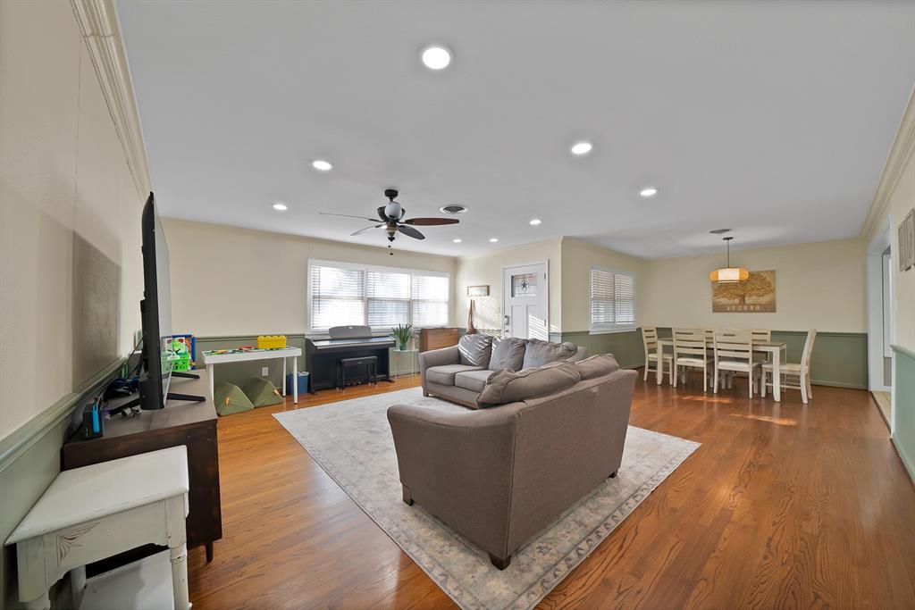 5705 Blue Ridge Drive Fort Worth, TX 76112 - Photo 15 of 40 a living room with furniture and a wooden floor
