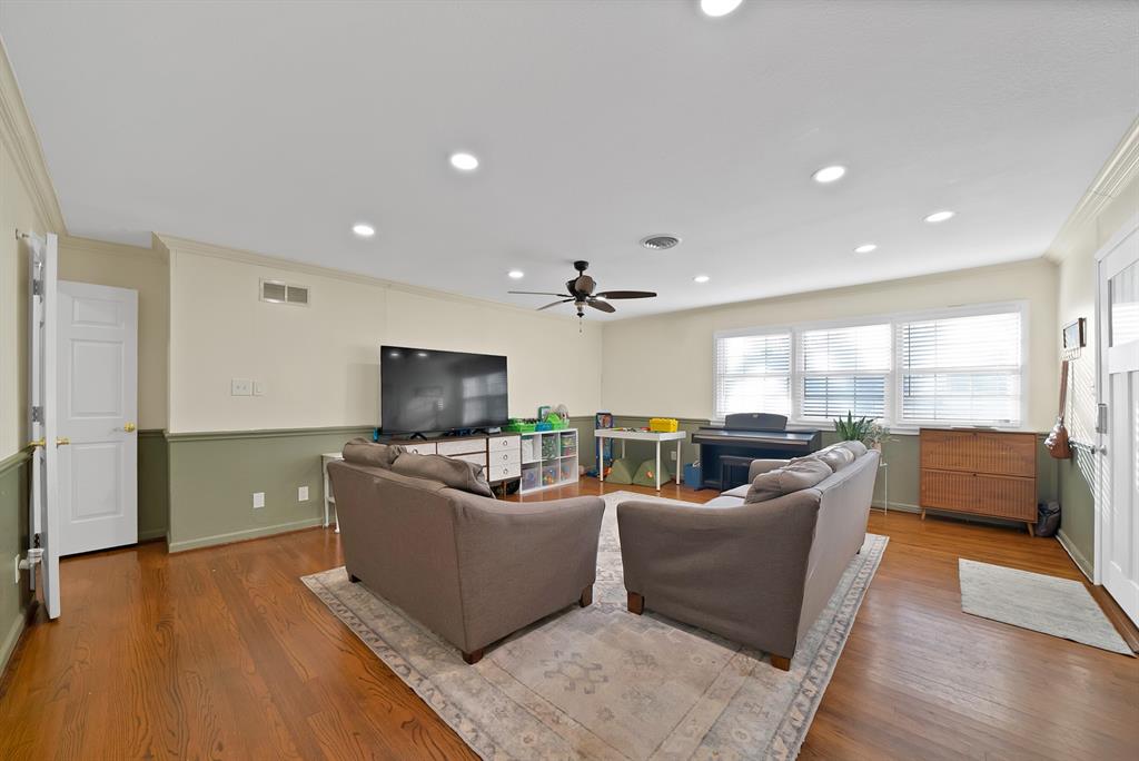 5705 Blue Ridge Drive Fort Worth, TX 76112 - Photo 16 of 40 a living room with furniture and a flat screen tv
